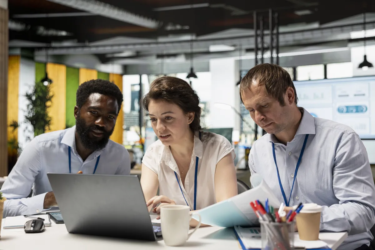 The EasyDire team collaborating in the office